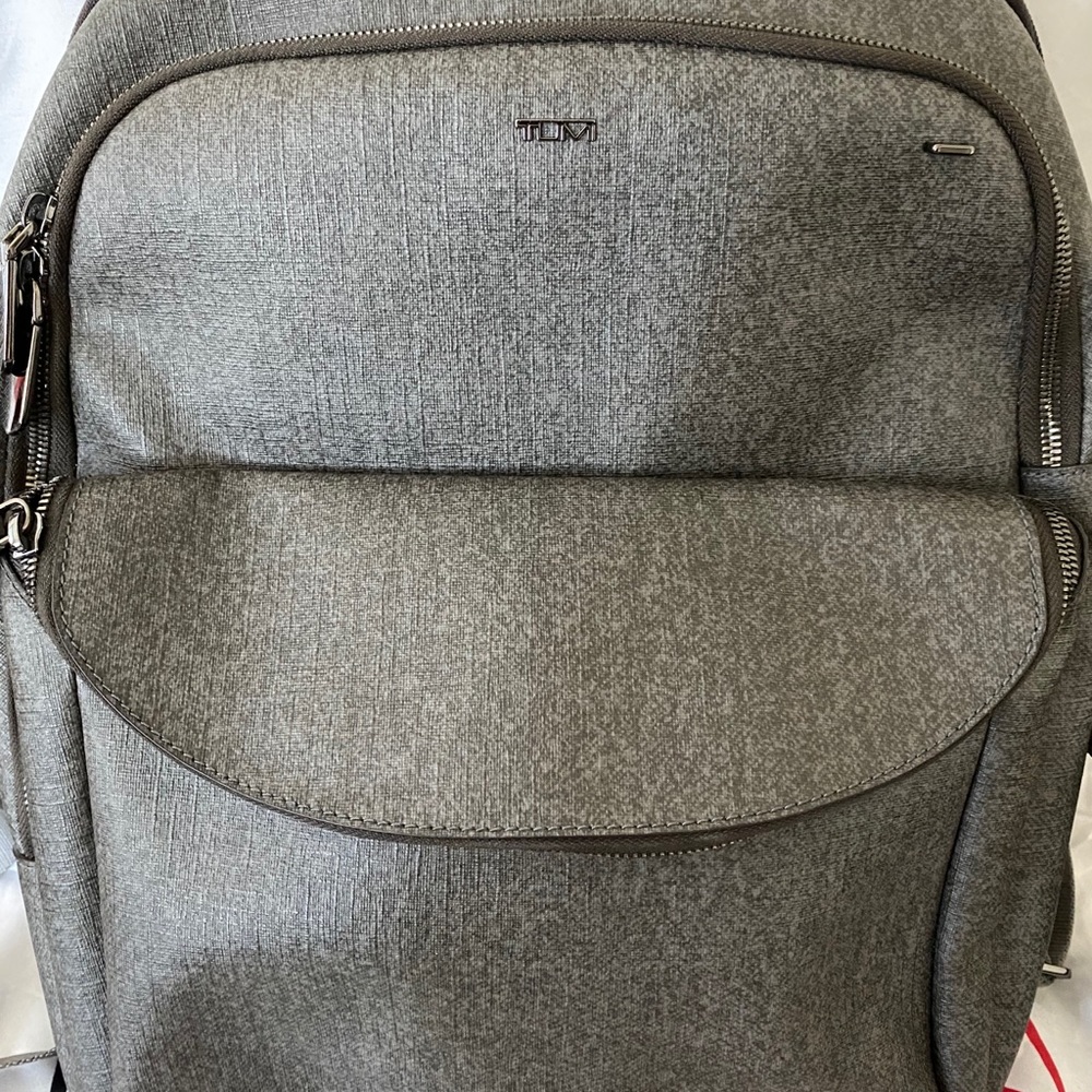 Tumi gray back pack